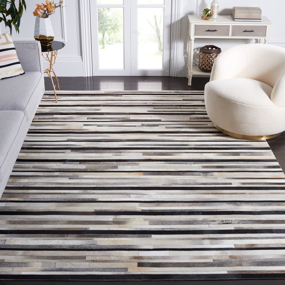 SAFAVIEH Handmade Studio Leather Syreeta Natural Hide Leather Rug