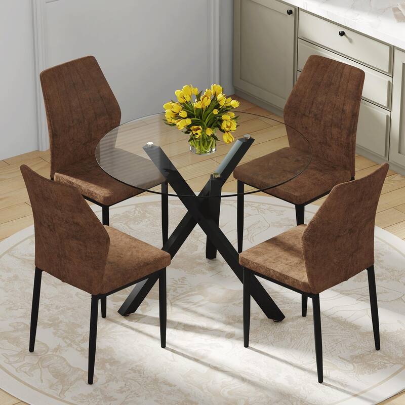 Table and chair set.Modern glass round table: X-shaped black metal bracket. Paired with 4 Dining Chairs