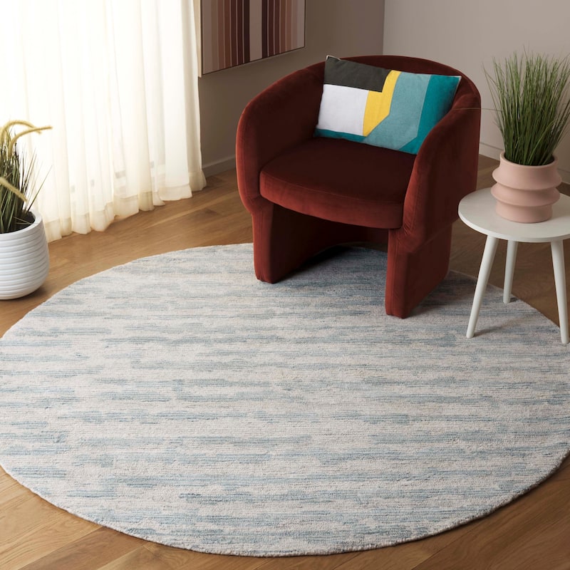 SAFAVIEH Handmade Ebony Anastasiya Modern & Contemporary Wool Rug