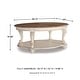 preview thumbnail 7 of 5, Signature Design by Ashley Realyn Oval Cocktail Table - 48.13" W x 34" D x 19.88" H