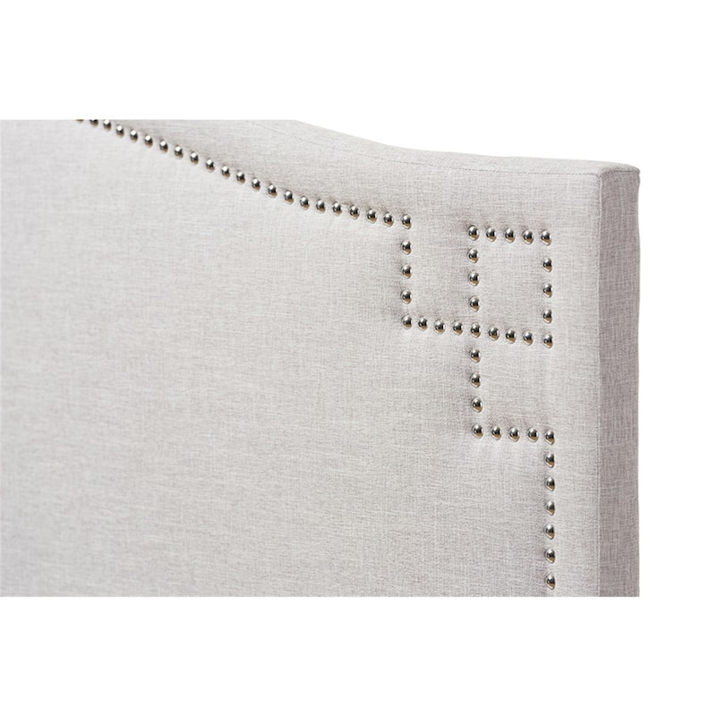 Glamorous Upholstered Fabric Headboard with Nailhead Detailing and Adjustable Height for a Luxurious Bedroom