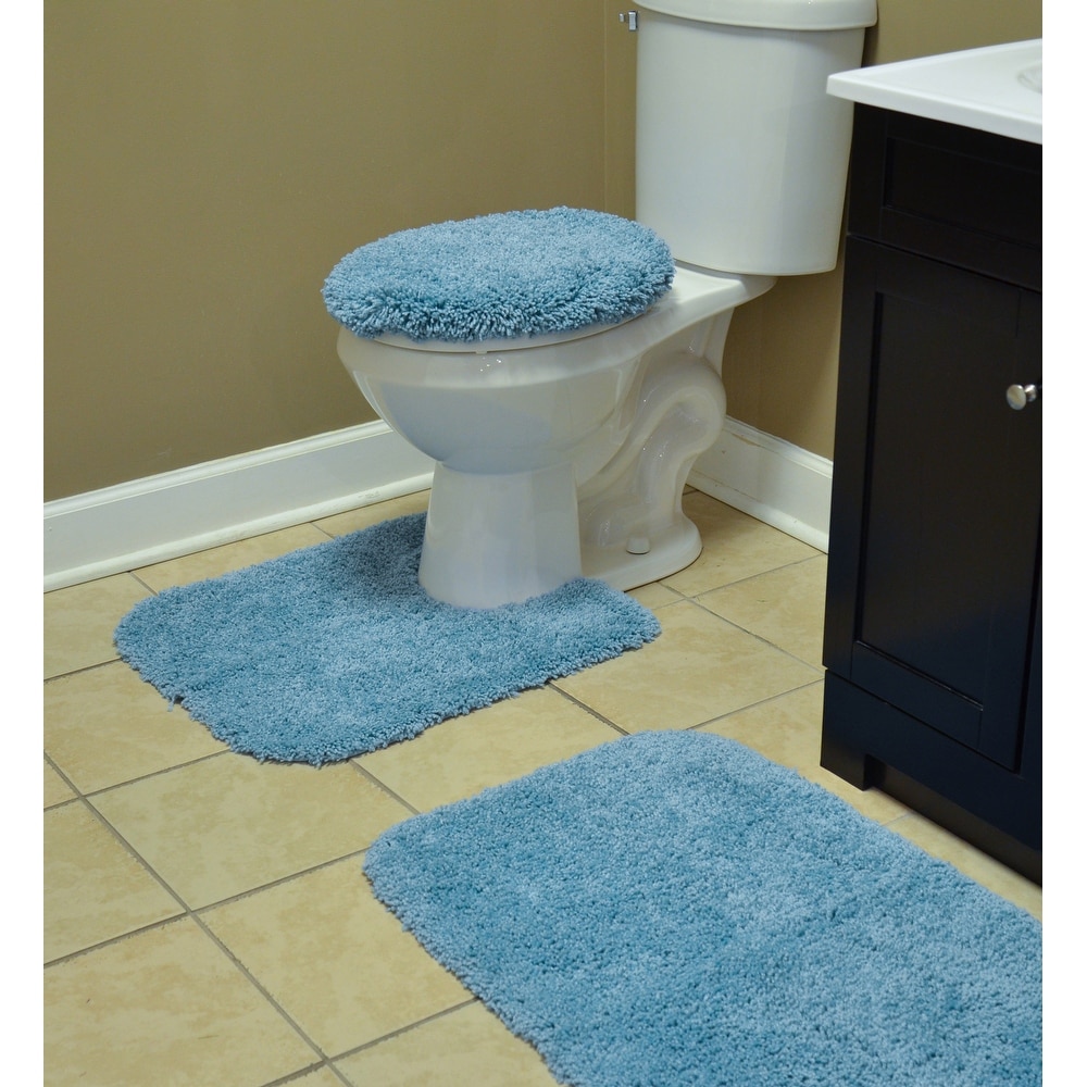https://ak1.ostkcdn.com/images/products/is/images/direct/e8a92810223538e10a50533f642ee637d0fc6014/Serendipity-Shag-Washable-Nylon-Bathroom-Rug%2C-or-Set-in-Basin-Blue.jpg