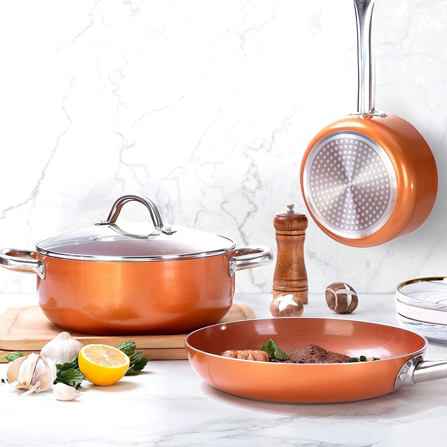 https://ak1.ostkcdn.com/images/products/is/images/direct/e8d2c58fa776960b2ae278c23d571d5a464407e4/Copper-Pots-and-Pans-Set-Nonstick-10-Piece-Ceramic-Cookware-Set%2C-Stainless-Steel-Handles.jpg