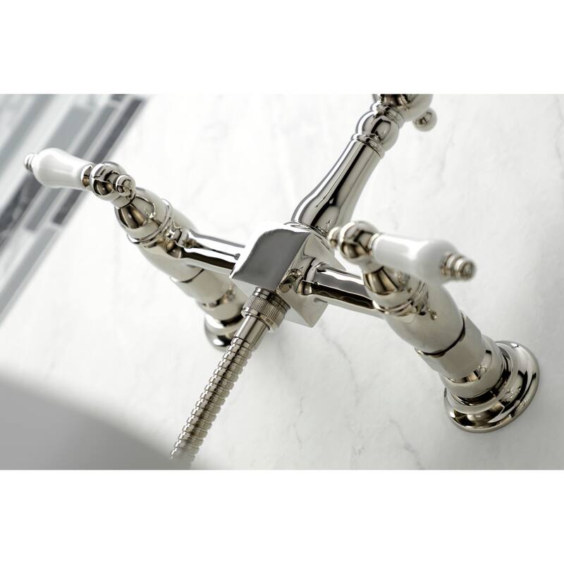 Kingston Brass Heritage Wall Mount Bridge Kitchen Faucet with Brass Sprayer