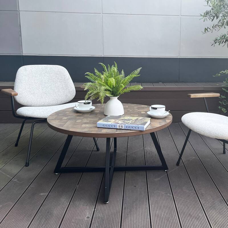 Round Coffee Table with Wood Grain and Black Metal, a Stylish and Functional Centerpiece for Your Living Space.