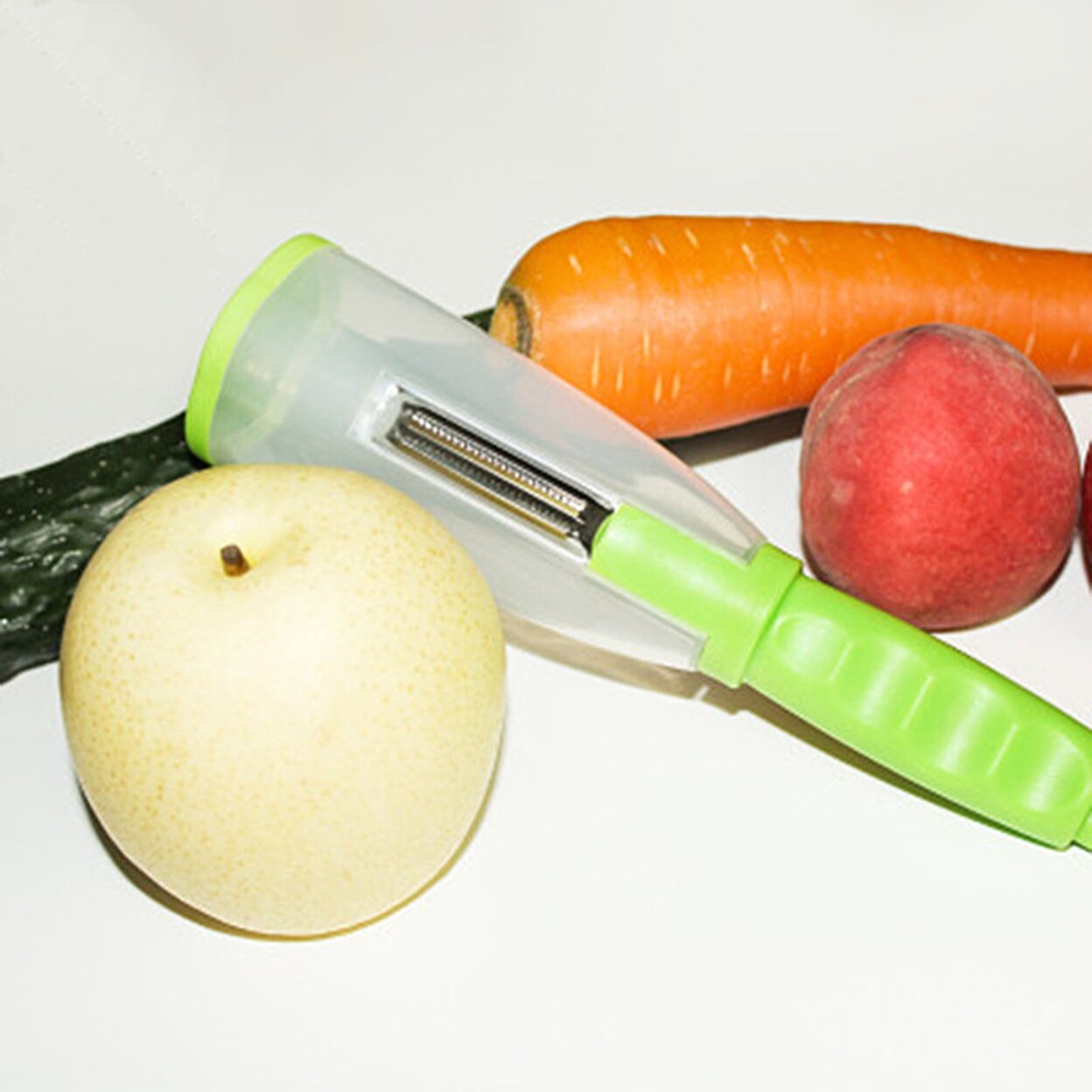 https://ak1.ostkcdn.com/images/products/is/images/direct/e94e122a5a794790b0bc72d8e595fd4e91e7506a/Abs-Fruit-Vegetable-Peeler-Home-Multifunctional-Kitchen-Tool-With-Storage-Tube.jpg