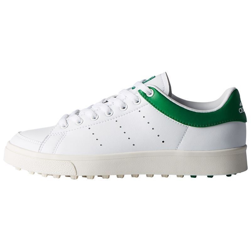 green and white golf shoes
