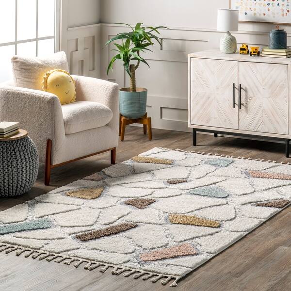 slide 2 of 7, Nuloom Zende Colorful Stones Kids Tassel Area Rug 4' x 6' - Beige