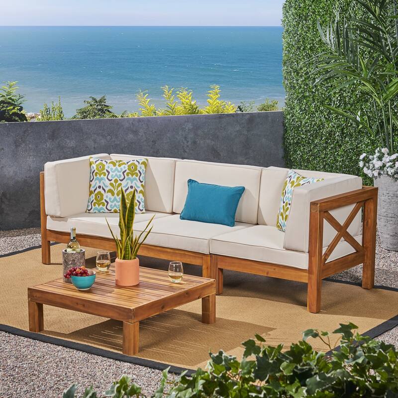 Brava Outdoor 3-Seater Acacia Wood Sectional Sofa Set with Coffee Table and Cushions by Christopher Knight Home