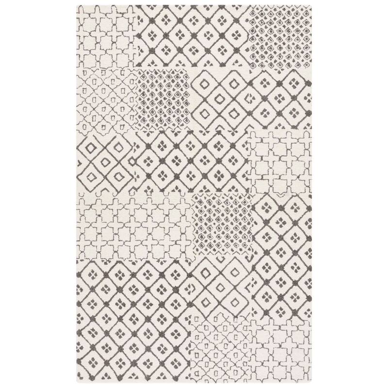 SAFAVIEH Handmade Ebony Gulhatun Wool Rug