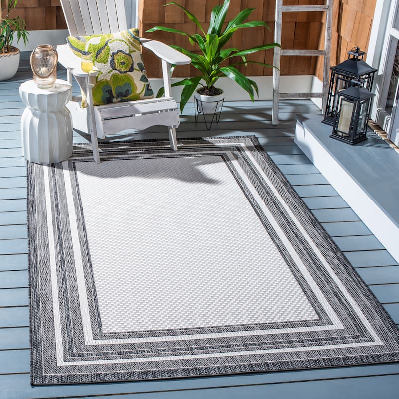 SAFAVIEH Courtyard Vickie Indoor/ Outdoor Waterproof Patio Backyard Rug - 8' x 10' - Ivory/Black