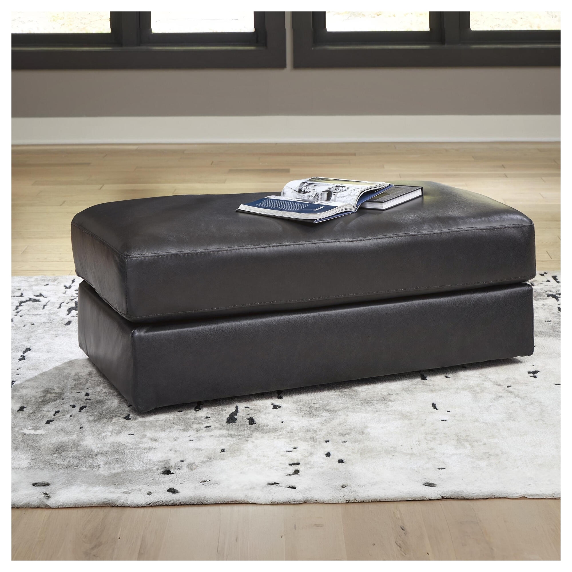 Signature Design by Ashley Amiata Black Ottoman