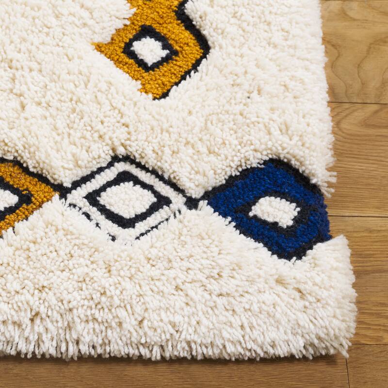 SAFAVIEH Handmade Casablanca Etleva Shag Boho Wool 1-inch Rug
