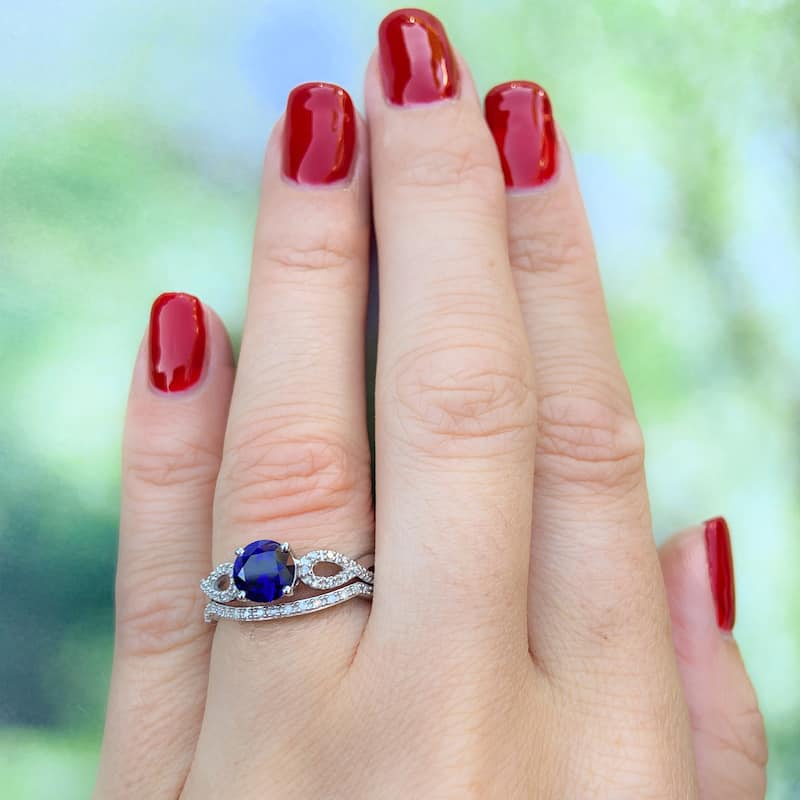 Miadora 10k White Gold Created Blue Sapphire and 1/6ct TDW Diamond Bridal Ring Set