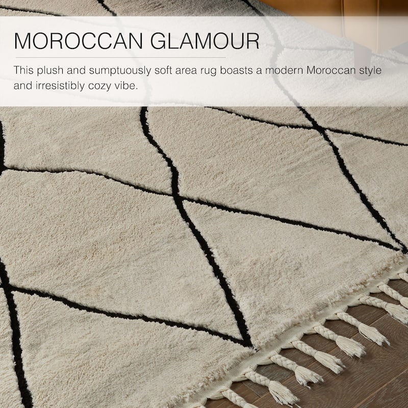 Treble Trellis Ivory/ Black Area Rug.