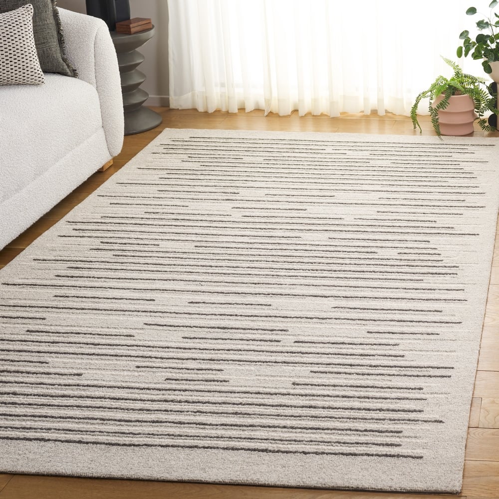 SAFAVIEH Handmade Ebony Isaure Modern Striped Wool Rug