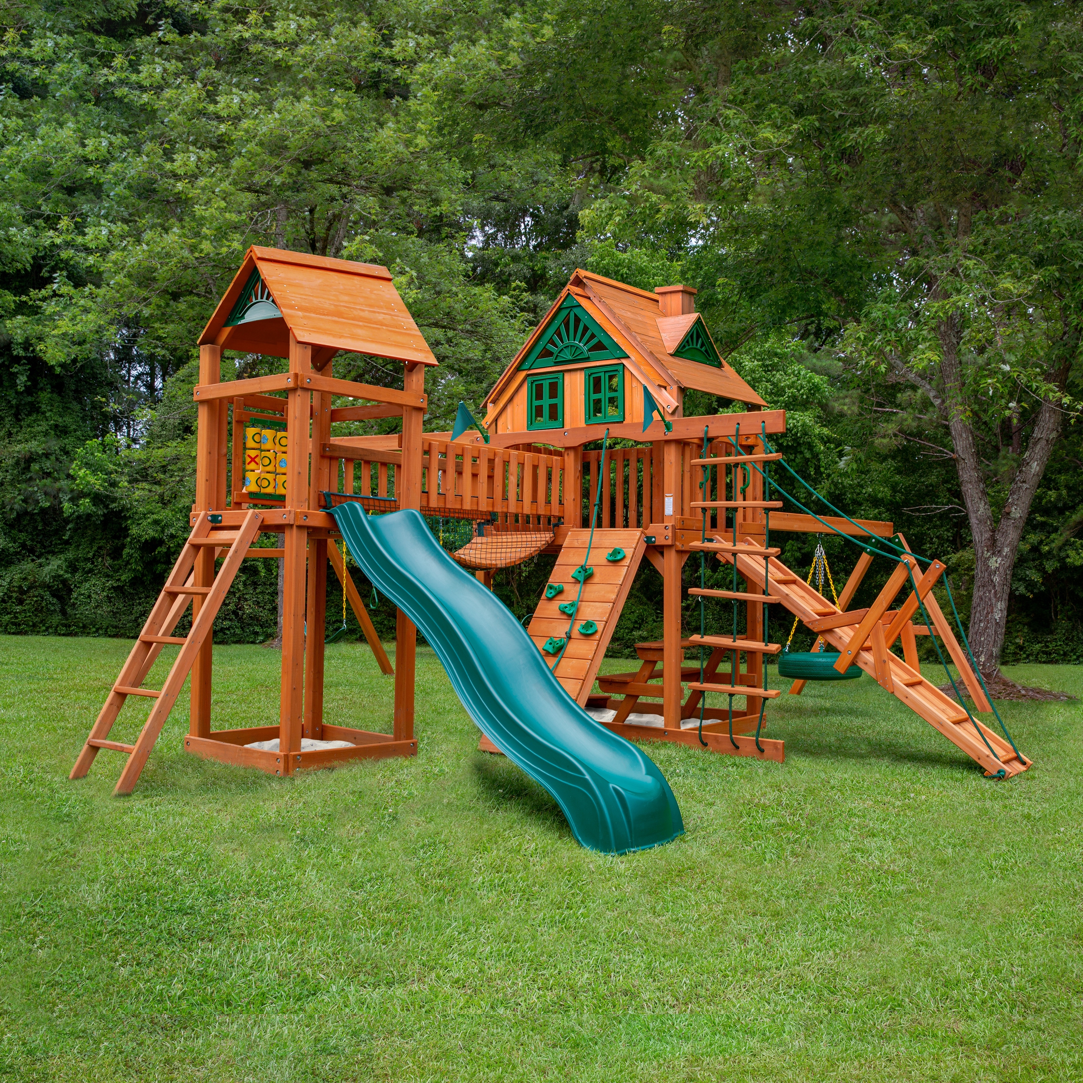 Gorilla Playsets Pioneer Peak Treehouse Wood Swing Set Amber