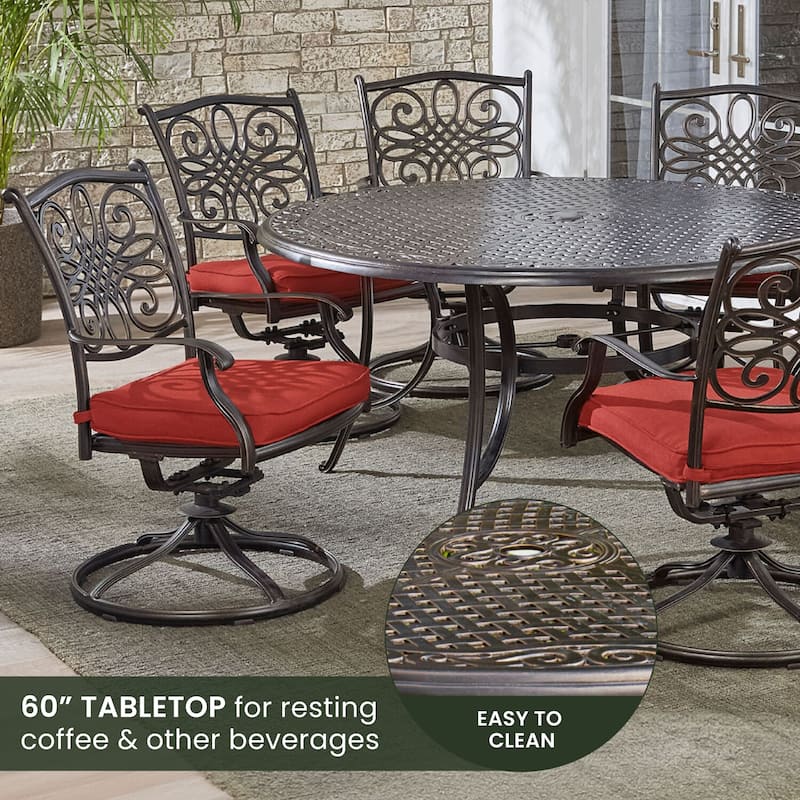 Hanover Traditions 7-Piece Dining Set in Red with a 60 In. Round Cast-top Table and Six Swivel Rockers
