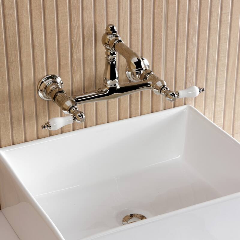 Kingston Brass English Country Two-Handle 2-Hole Wall Mount Bathroom Faucet