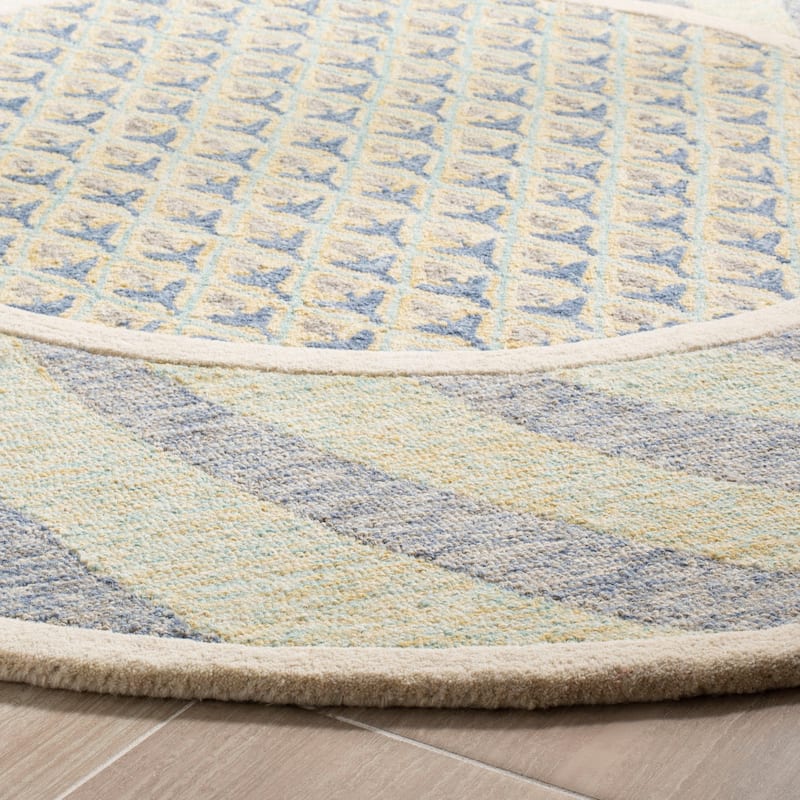 SAFAVIEH Handmade Novelty Linie Swirl Wool Rug