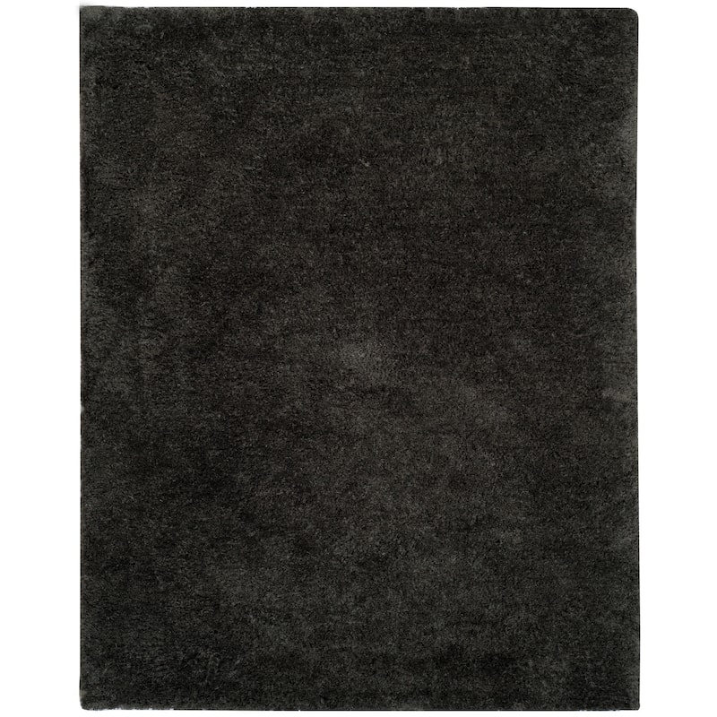 SAFAVIEH Handmade Ryann Shag Anneclaar Solid Polyester Rug