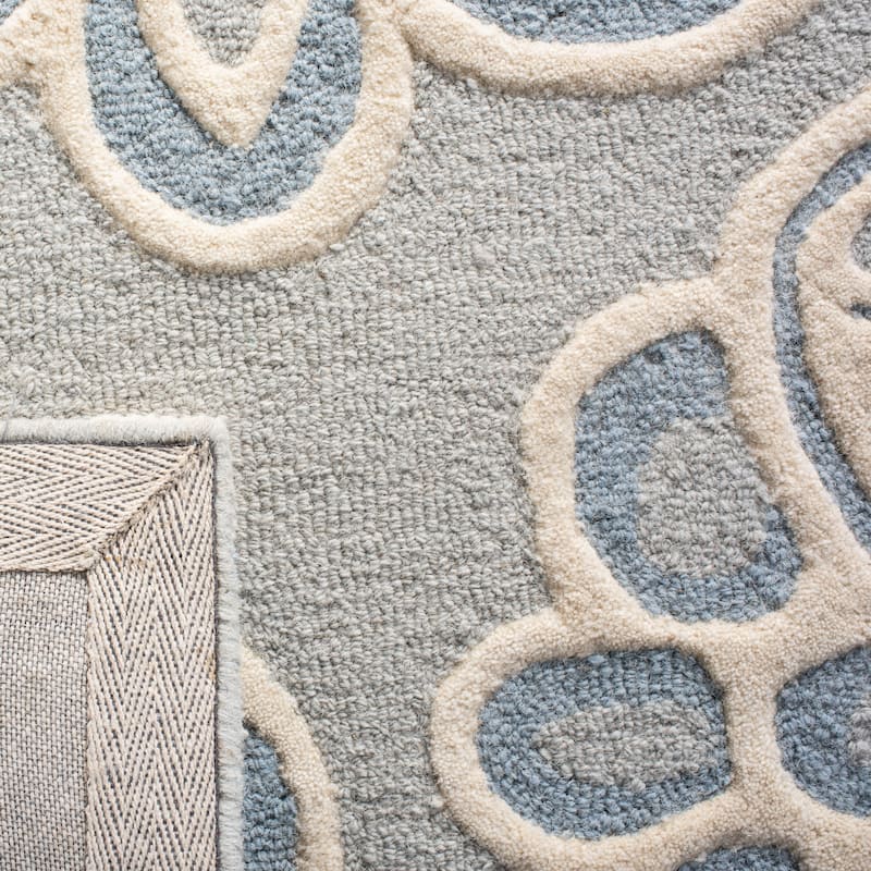SAFAVIEH Handmade Cambridge Youlia Modern Wool Rug