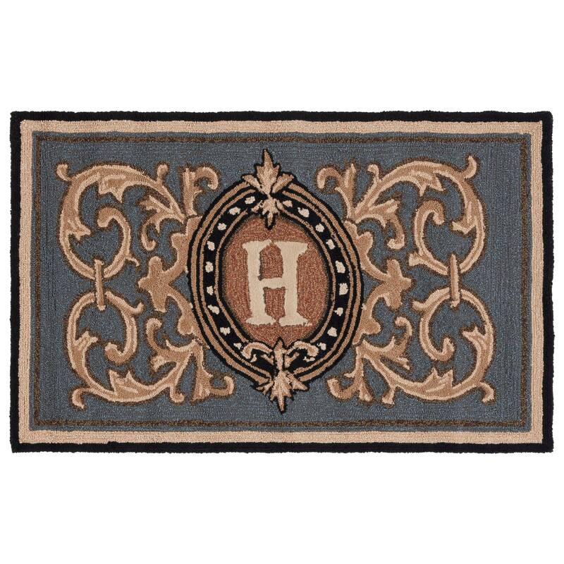 SAFAVIEH Handmade Monogram Griseldis Casual Rug