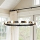 preview thumbnail 1 of 8, Rezz Black Modern Wagon Wheel LED Large Chandelier - 33.86 in. W x 32.68 in. H x 33.86 in. D 33.86 in. W x 32.68 in. H x 33.86 in. D - Black
