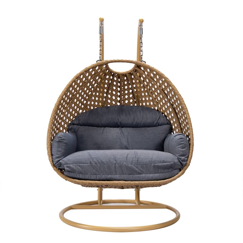 LeisureMod Mendoza 2-Person Hanging Egg Swing Chair - Handcrafted Light Brown Wicker, Patio Hammock Lounger with Cushions - 53"