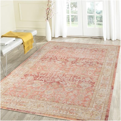 Aurelia Sina Bordered Area Rug
