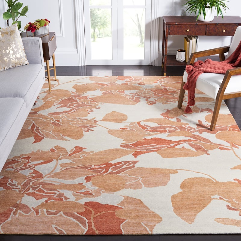 SAFAVIEH Couture Hand-knotted Tibetan Mair Modern Wool Rug - 8' x 10' - Cream/Orange