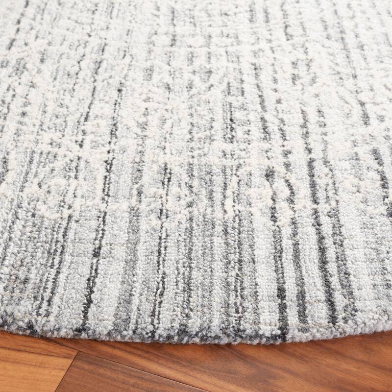 SAFAVIEH Handmade Ebony Satoko Medallion Wool Rug