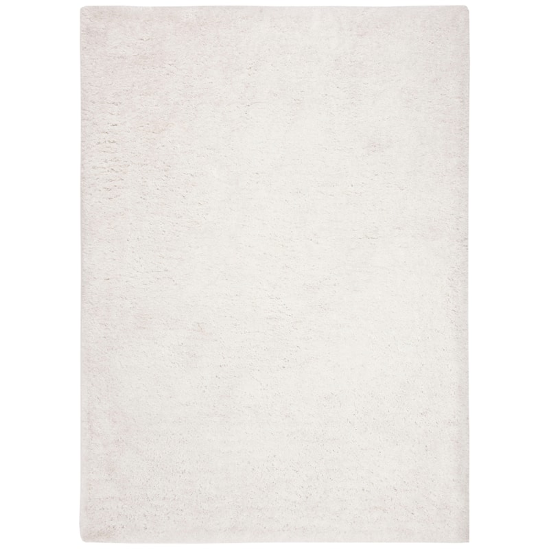 SAFAVIEH Handmade South Beach Leonella Shag Solid Polyester Rug