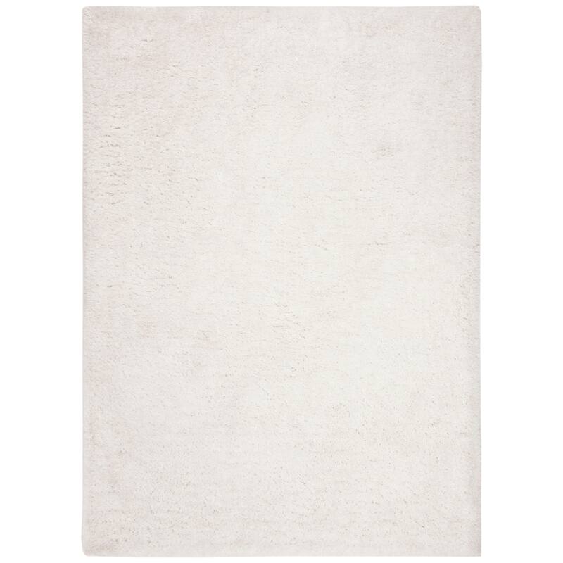 SAFAVIEH Handmade South Beach Leonella Shag Solid Polyester Rug