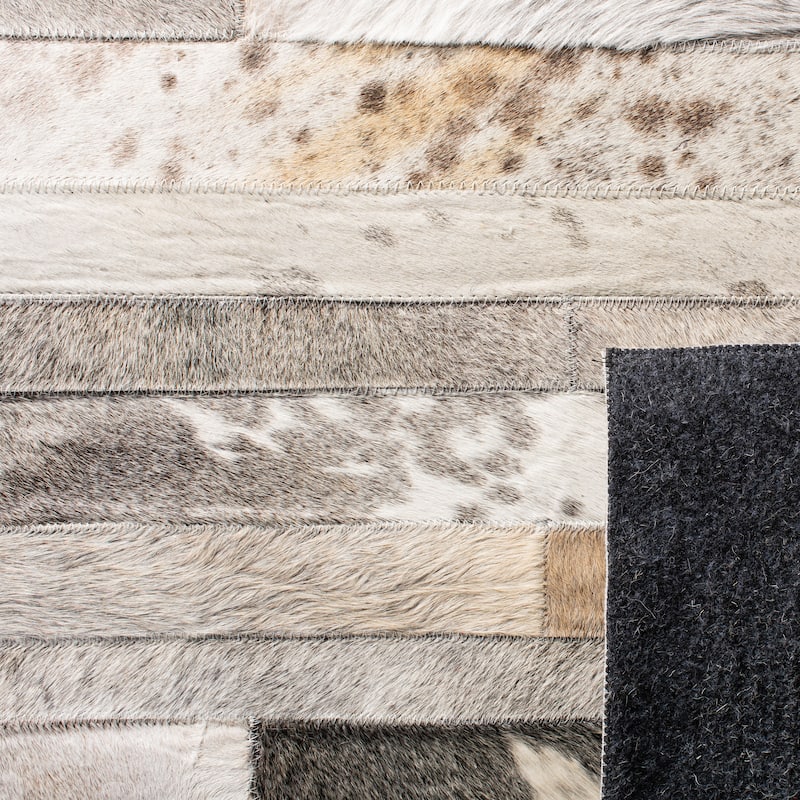 SAFAVIEH Handmade Studio Leather Tennille Modern Leather Rug