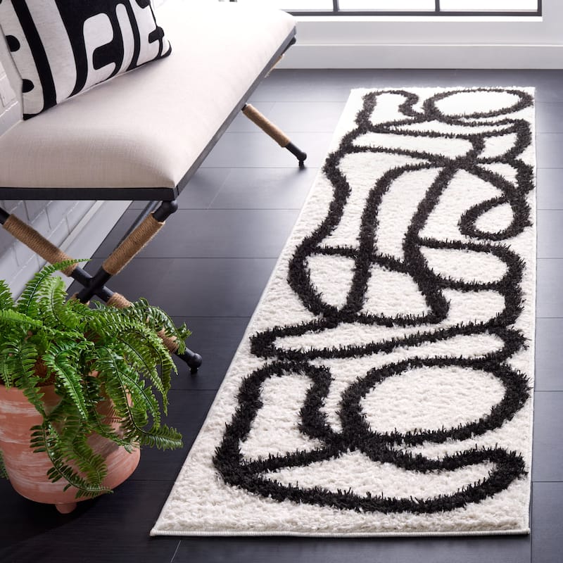 SAFAVIEH Norway Shag Judie Mid-Century Modern 1.2-inch Thick Rug - 2'2" x 10' Runner - Ivory/Black
