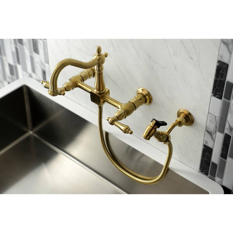 Kingston Brass Heritage Wall Mount Bridge Kitchen Faucet with Brass Sprayer