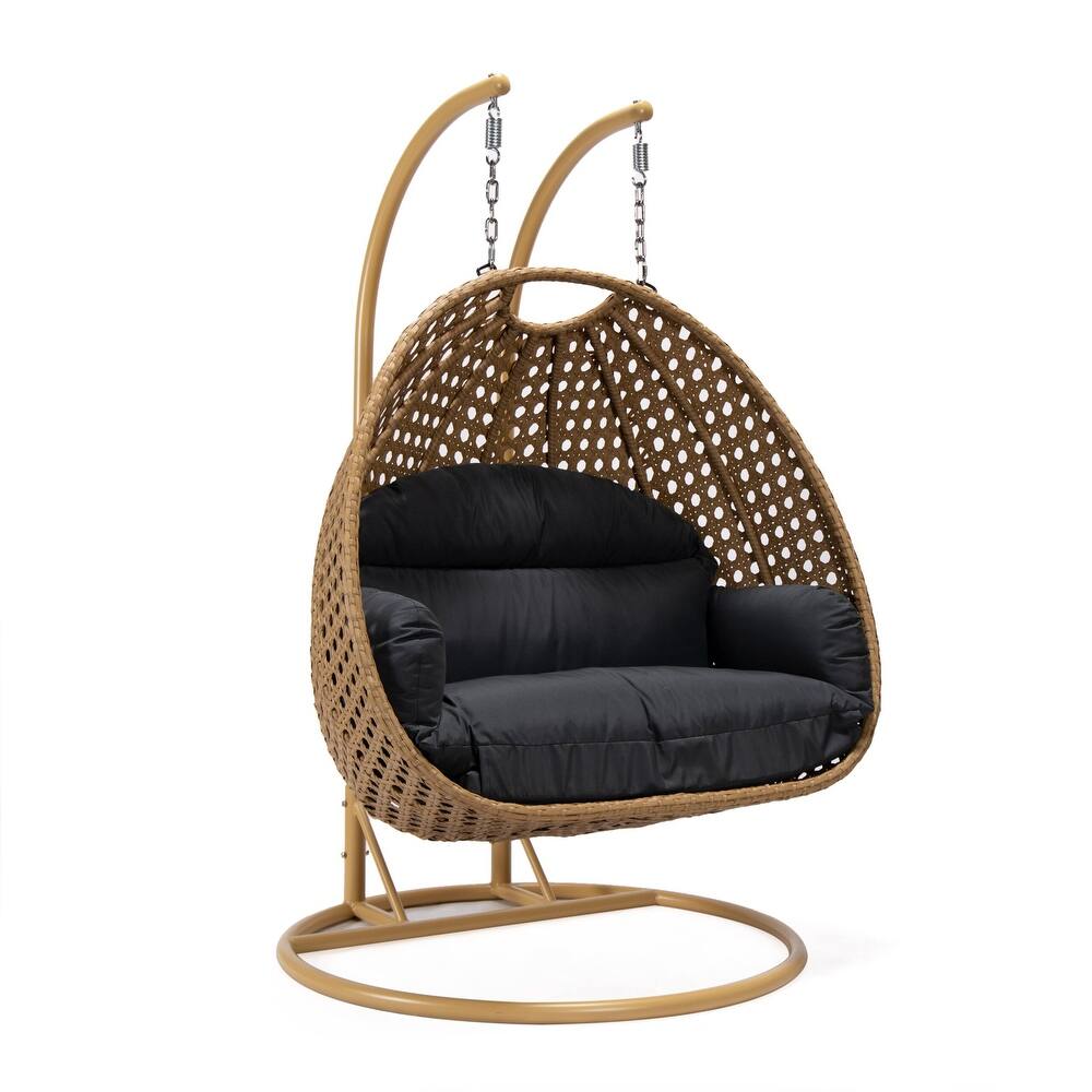 LeisureMod Mendoza 2-Person Hanging Egg Swing Chair - Handcrafted Light Brown Wicker, Patio Hammock Lounger with Cushions - 53"