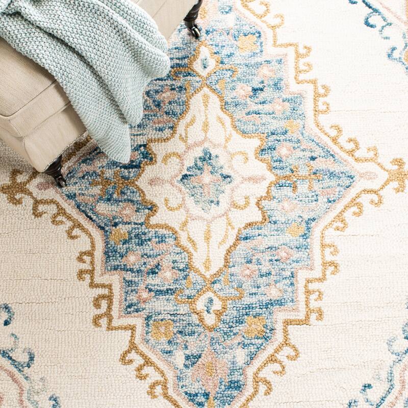 SAFAVIEH Handmade Micro-Loop Taimi Modern Wool Rug