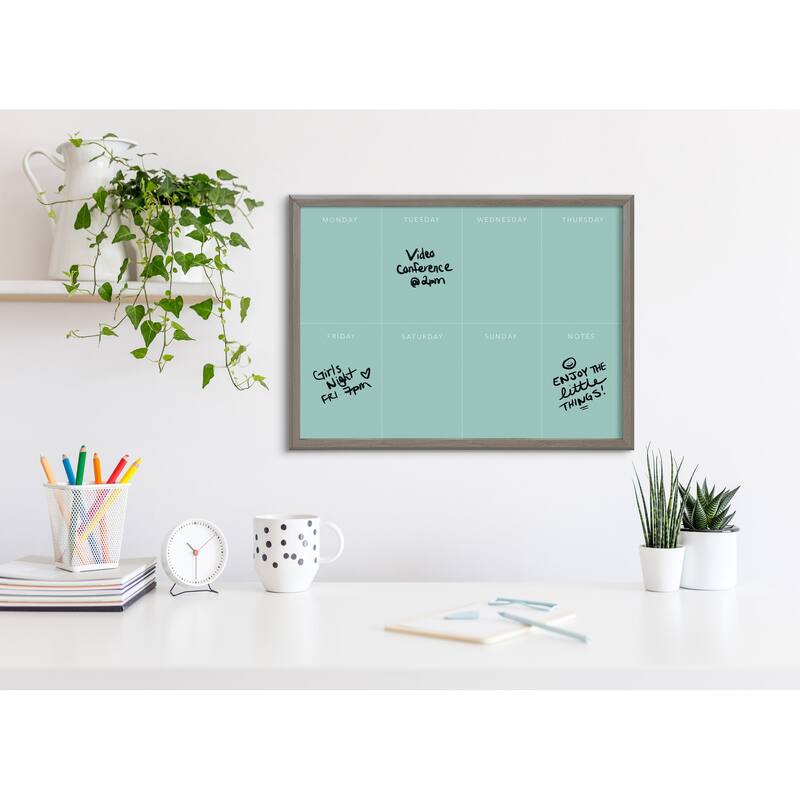 Kate and Laurel Blake This Week Teal Framed Printed Glass by The Creative Bunch Studio - 18x24