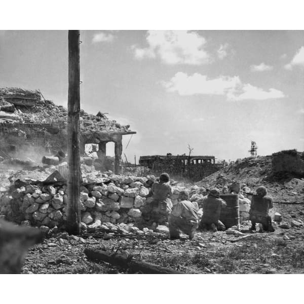 Marines Of The First Division Fire On Japanese Snipers In A Building On ...