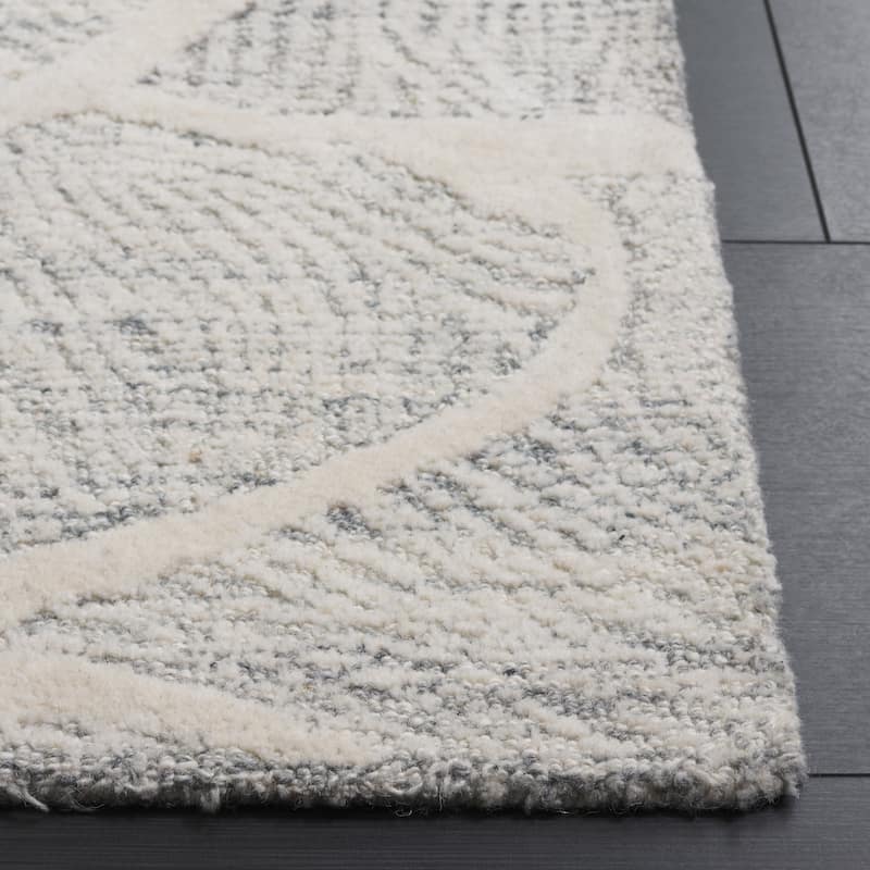 SAFAVIEH Handmade Pine Sucheta Contemporary Wool Rug