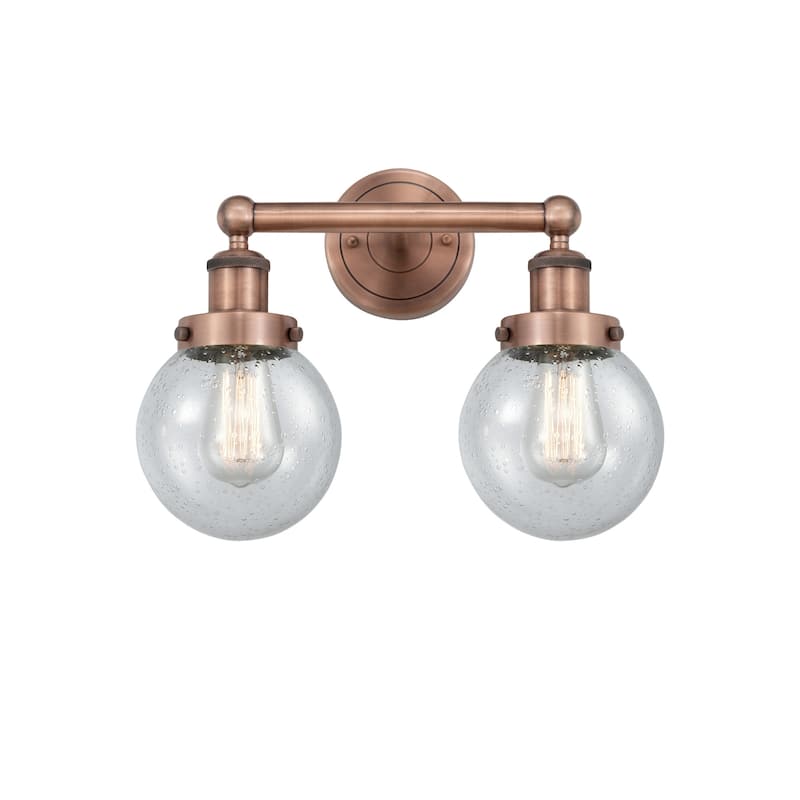 Innovations Lighting 616-2W-10-16 Beacon Vanity Beacon 2 Light 16" - Antique Copper / Seedy