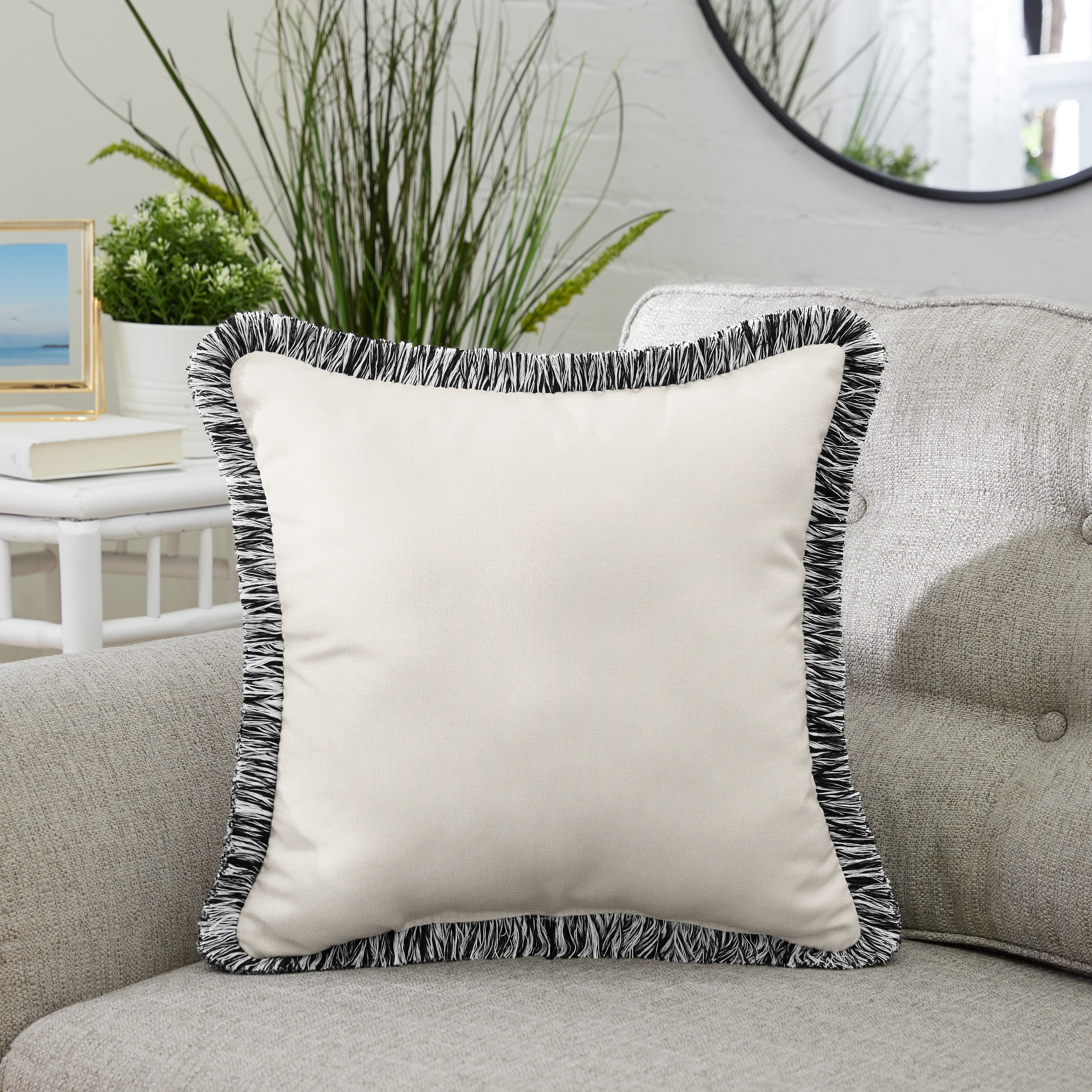 https://ak1.ostkcdn.com/images/products/is/images/direct/eb89f818b51aaeaa655344a5a1b7eb659d783100/Sunbrella-Canvas-Natural-Indoor--Outdoor-Square-Pillow-with-Fringe.jpg