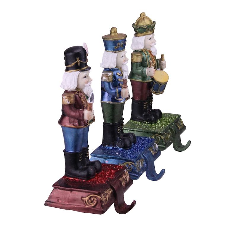 Set of 3 Blue, Red Green Glittered Nutcracker Stocking Holders 7.75"