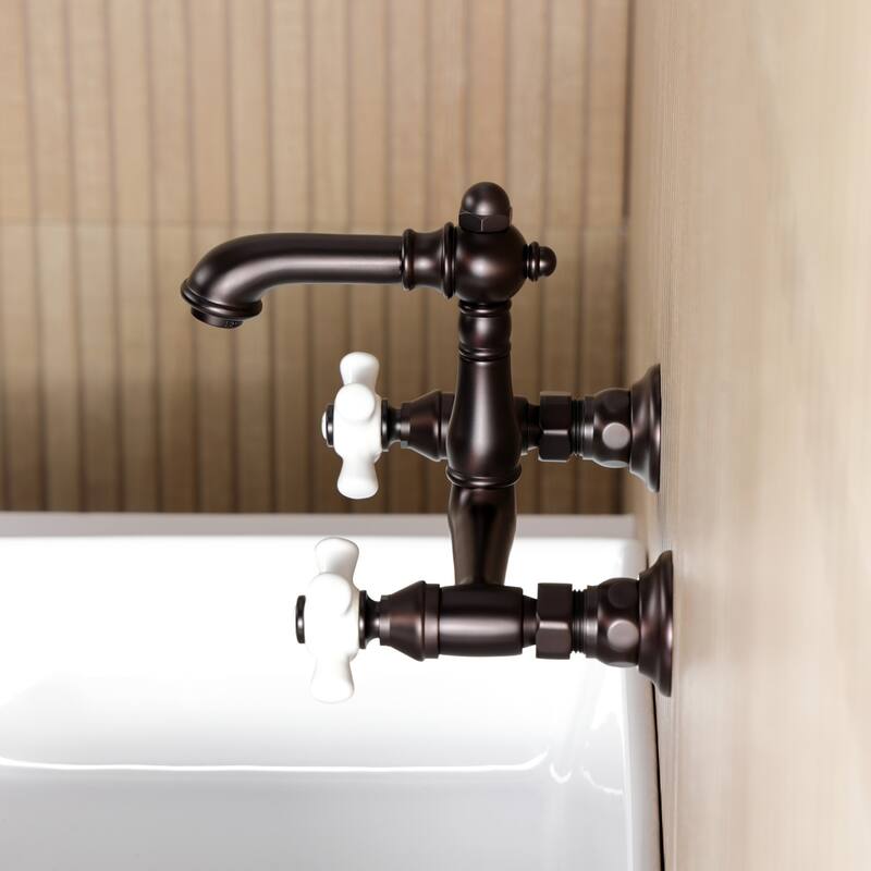 Kingston Brass English Country Two-Handle 2-Hole Wall Mount Bathroom Faucet