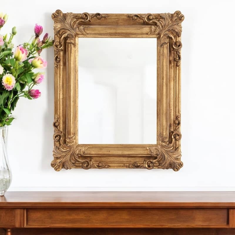 HomeRoots23" Antiqued Gold Ornate Scroll Framed Accent Mirror - 20" W x 2" D x 23" H - 20" W x 2" D x 23" H - Gold Leaf