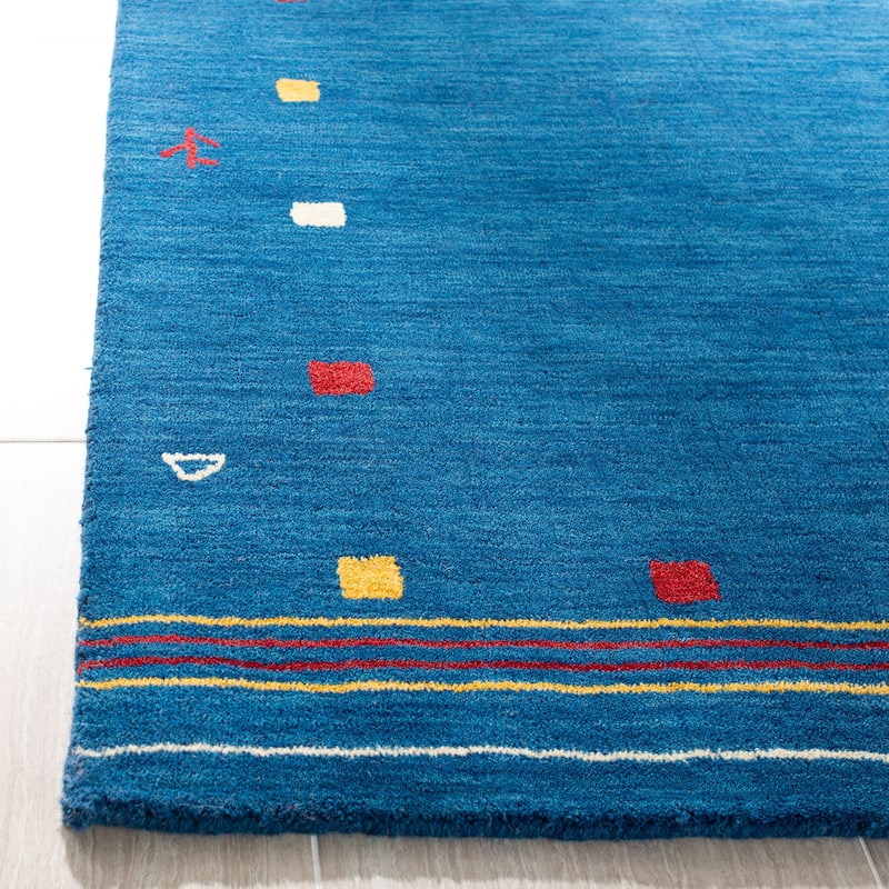 SAFAVIEH Handmade Himalaya Breann Border Wool Rug