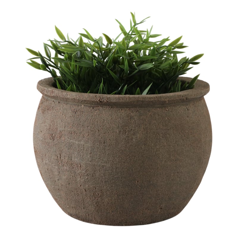 Terracotta Planter with Rounded Silhouette and Textured Surface
