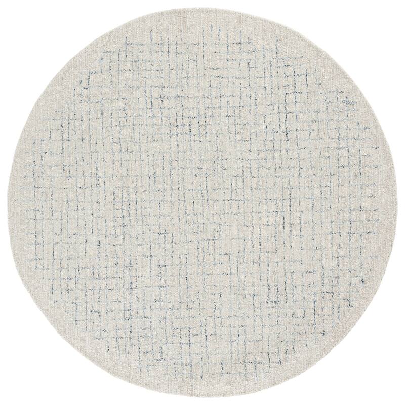 SAFAVIEH Handmade Ebony Bodhild Modern & Contemporary Wool Rug - 6' Round - Ivory/Navy